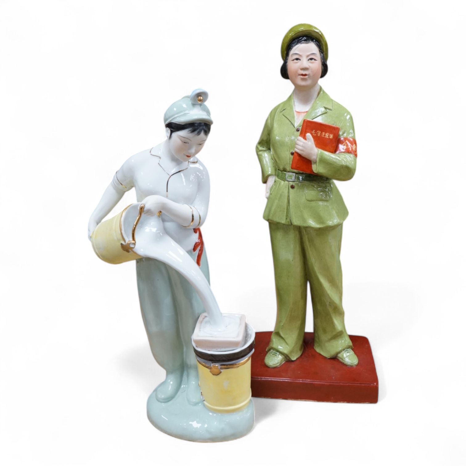 Two Chinese Cultural Revolution female figures, Tallest 42cm high. Condition - one figure face cracked, the other has wear to gilding.